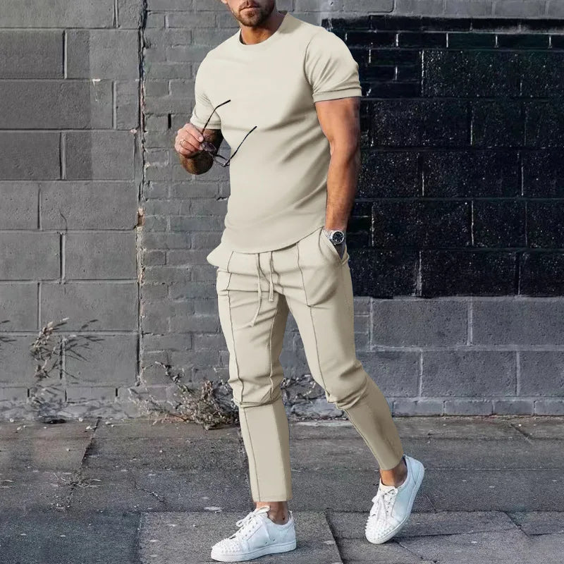 M-3XL  Ensemble de sport pour homme : t-shirt de sport uni à col rond et manches courtes + pantalon à poche, ensemble deux pièces de style streetwear